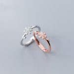 Adjustable ring with six petals in diamonds